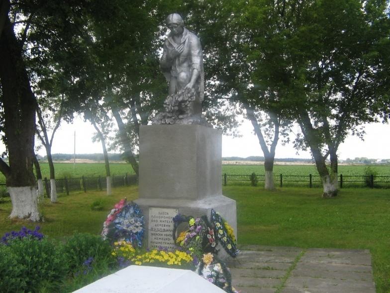 Братская могила жителей деревни Пузовичи, расположенная в д. Партизанская, Гродненский район, Гродненская область